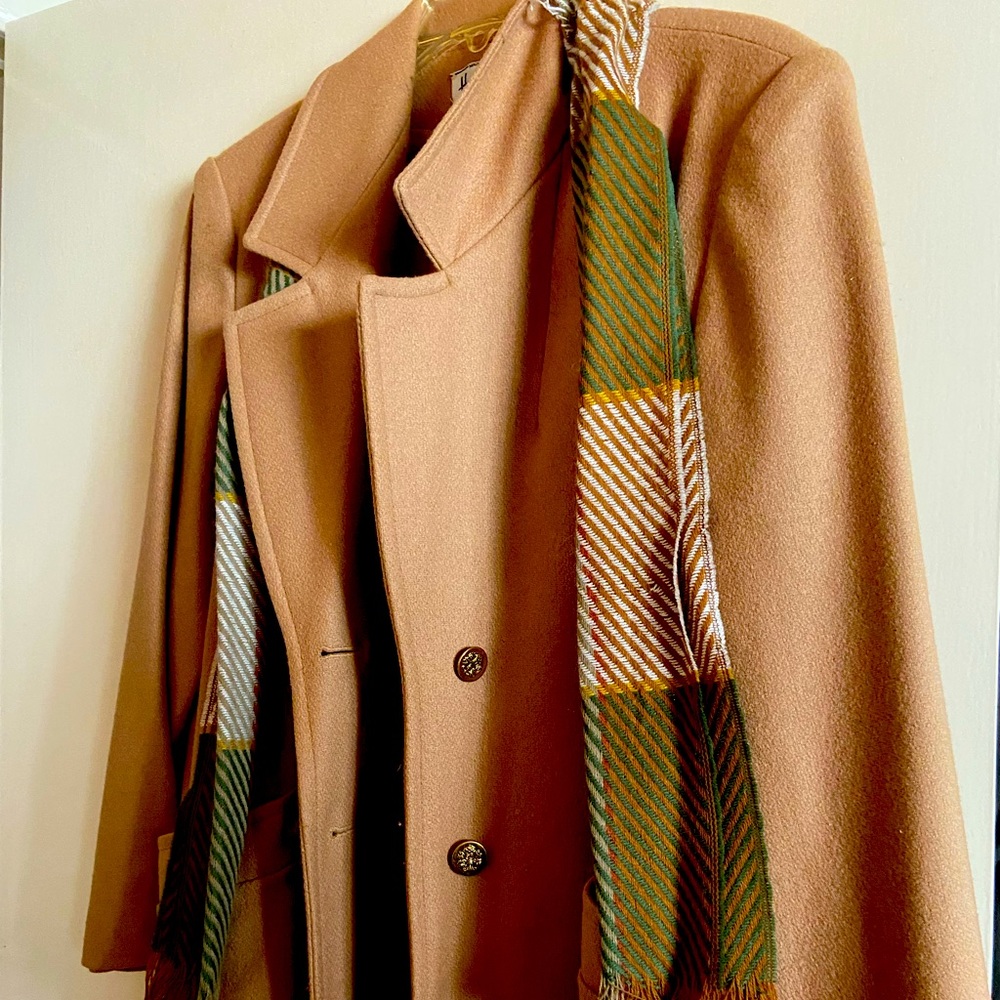 Tan, wool, vintage coat in excellent condition. Barely worn. No Tears,No Stains